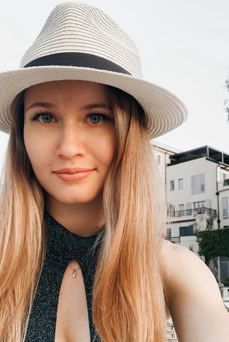 Solo girl with long blonde hair takes selfies in a variety of outfits