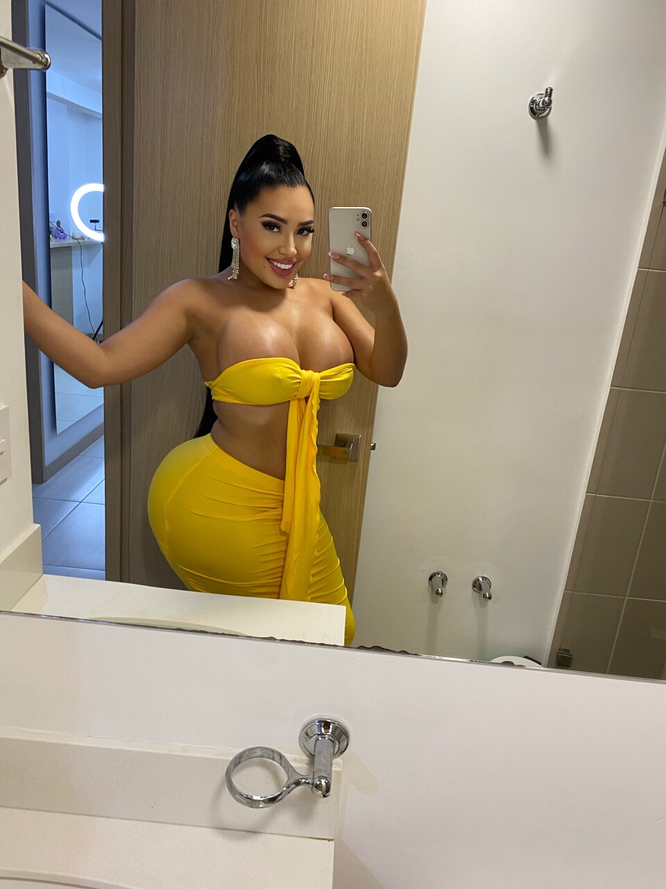 Hot Latina chick with a huge ass takes selfies in a variety of outfits