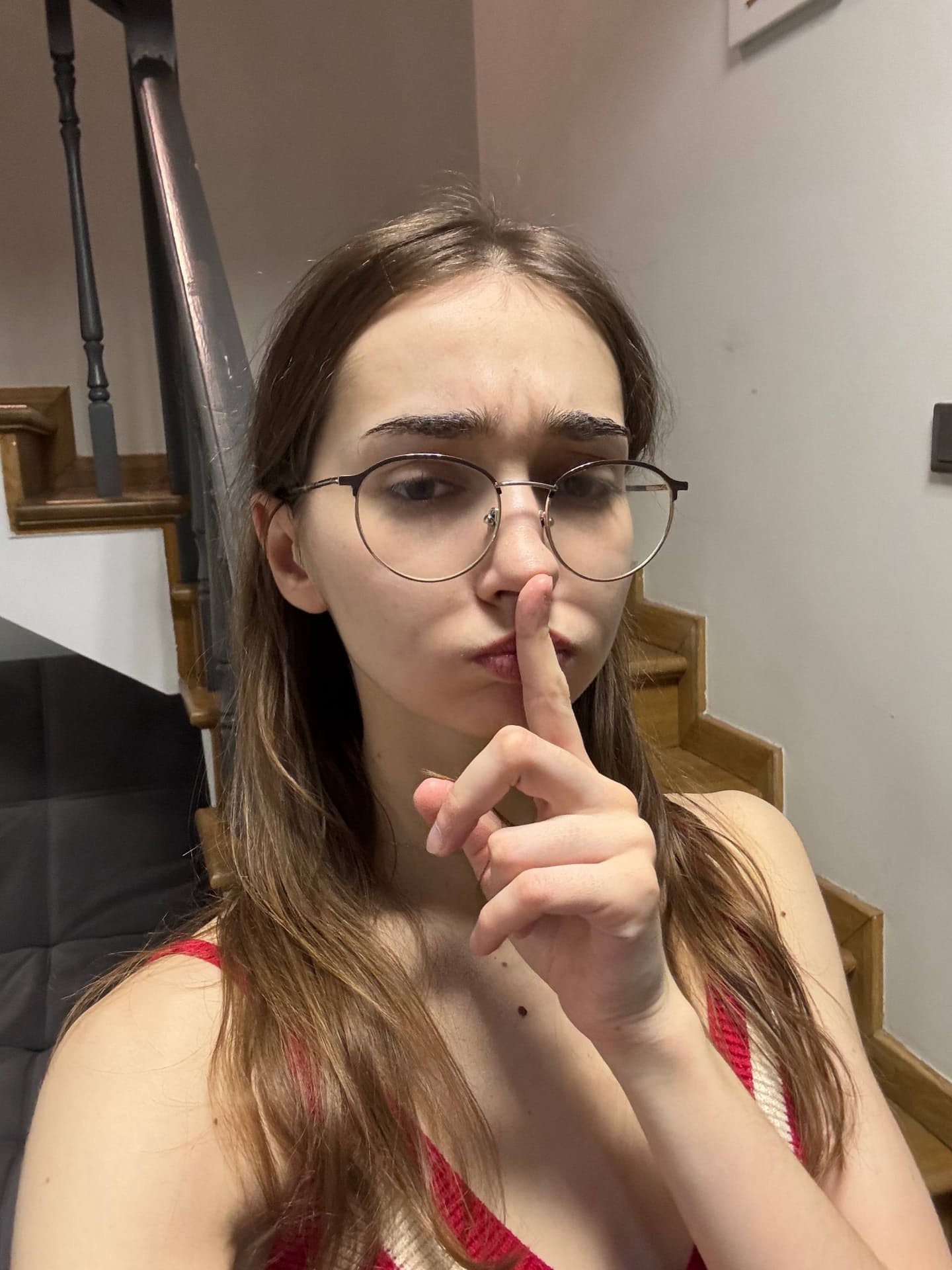 Glasses clad teen strikes great solo poses while mostly clothed