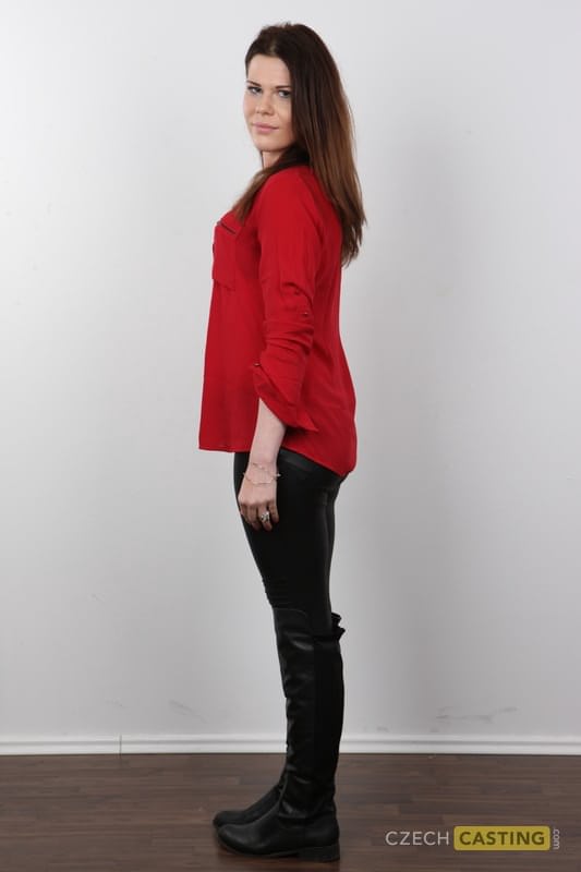 Amateur girl with reddish hair takes off all her clothes and footwear