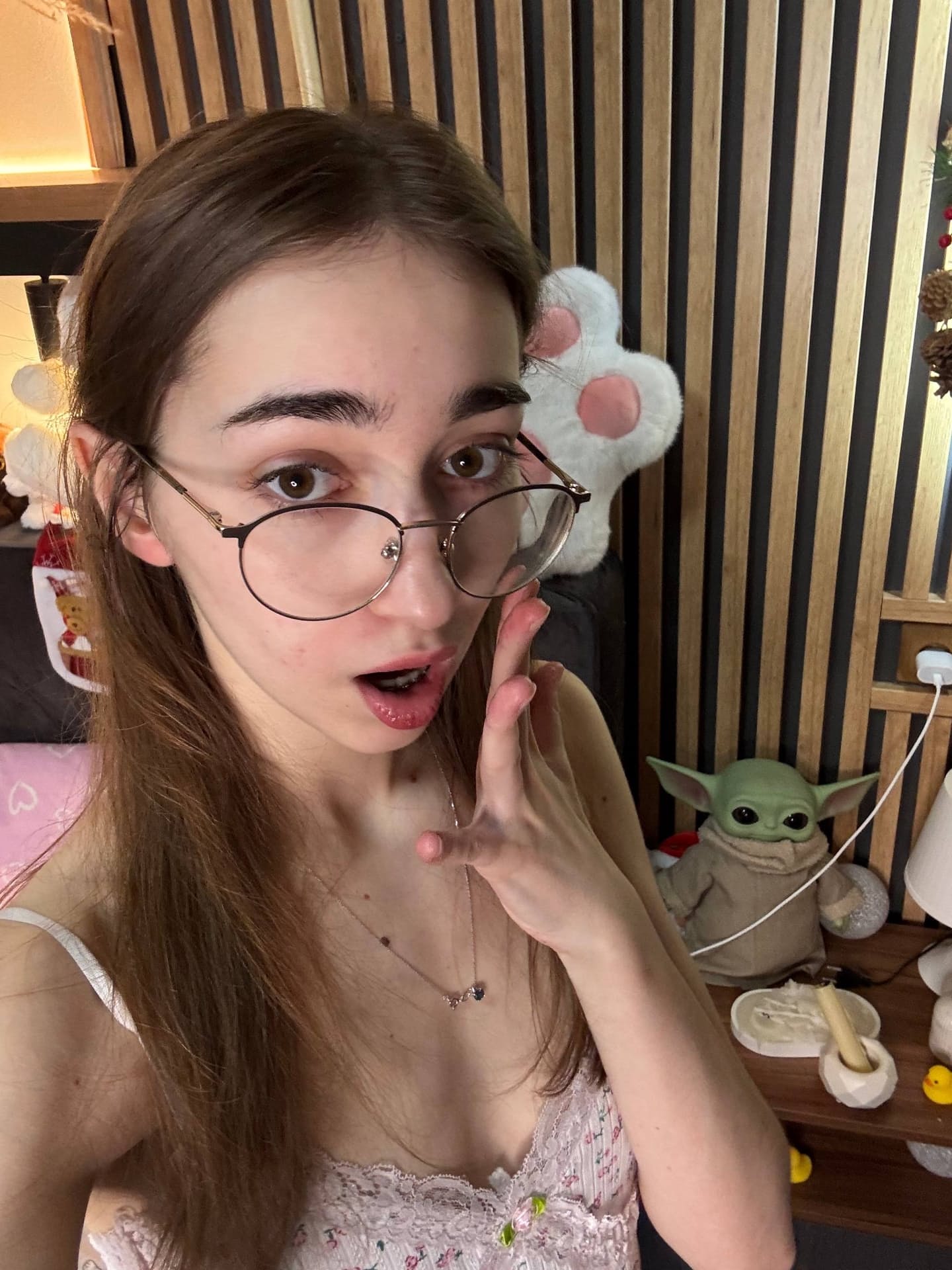 Glasses clad teen strikes great solo poses while mostly clothed