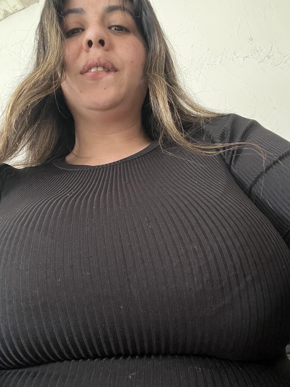 Latina amateur shows her big butt while wearing a short dress