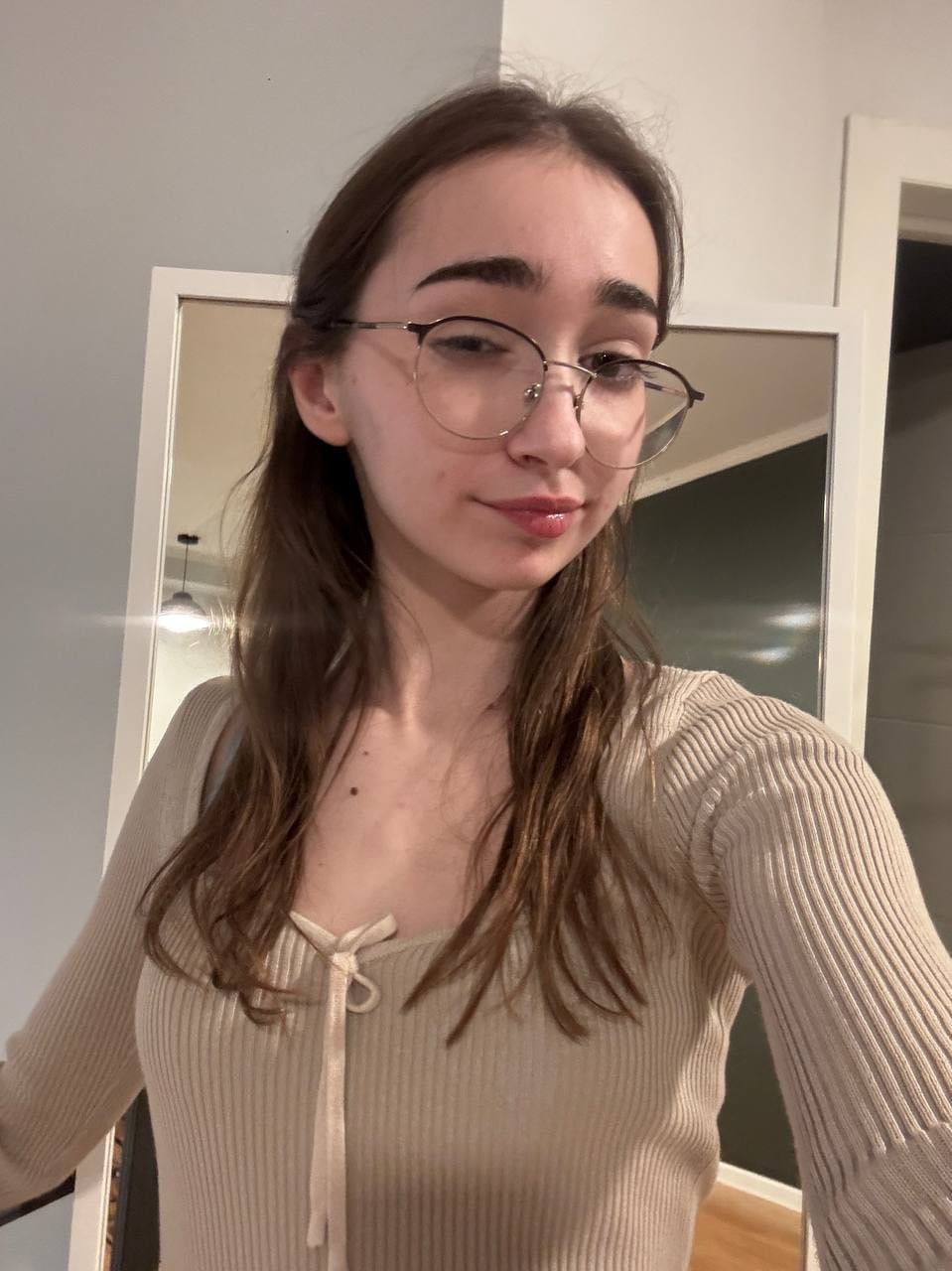 Glasses clad teen strikes great solo poses while mostly clothed