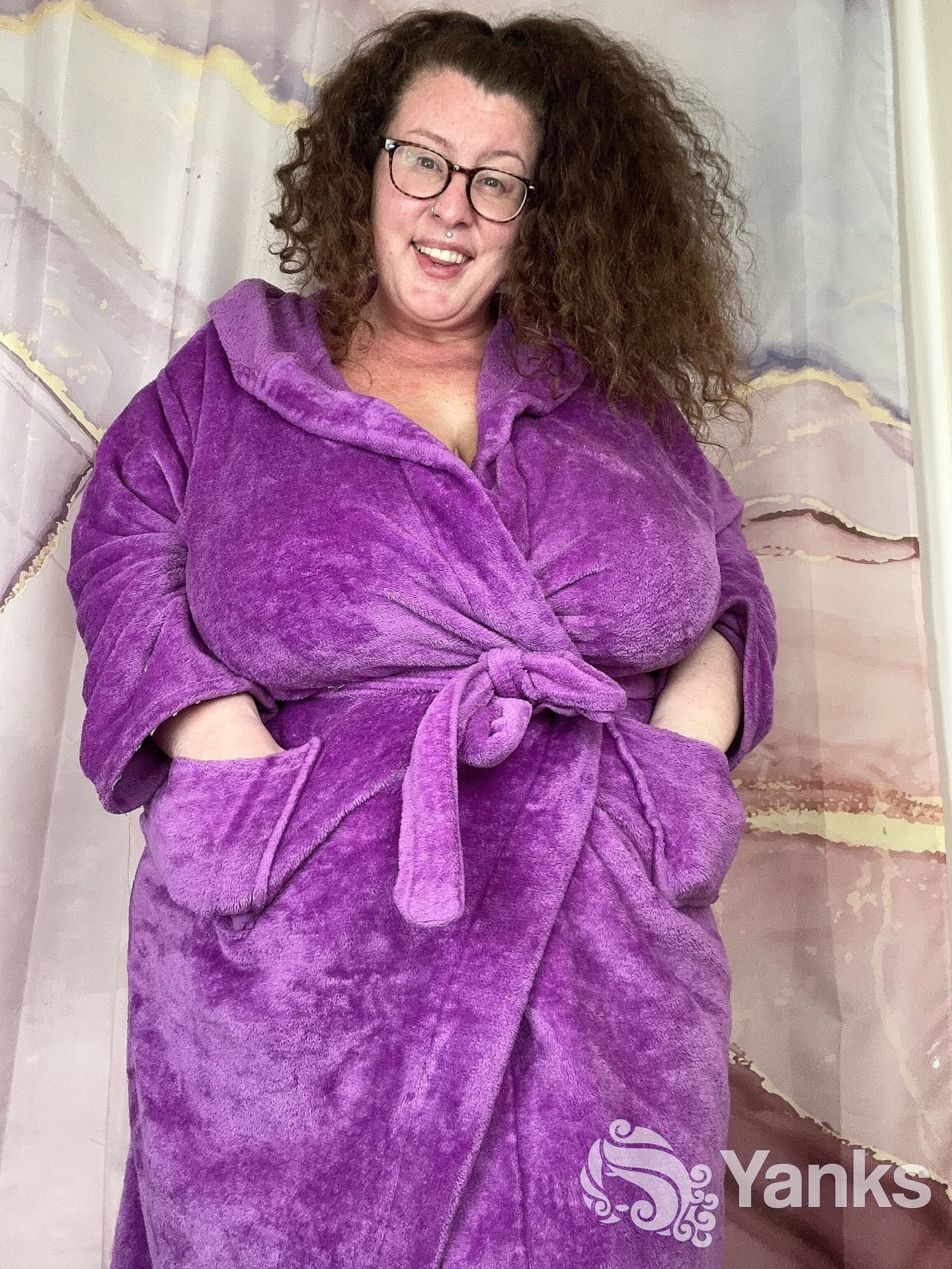 Curly haired amateur Delilah Brooke strips while showing off her chubby body