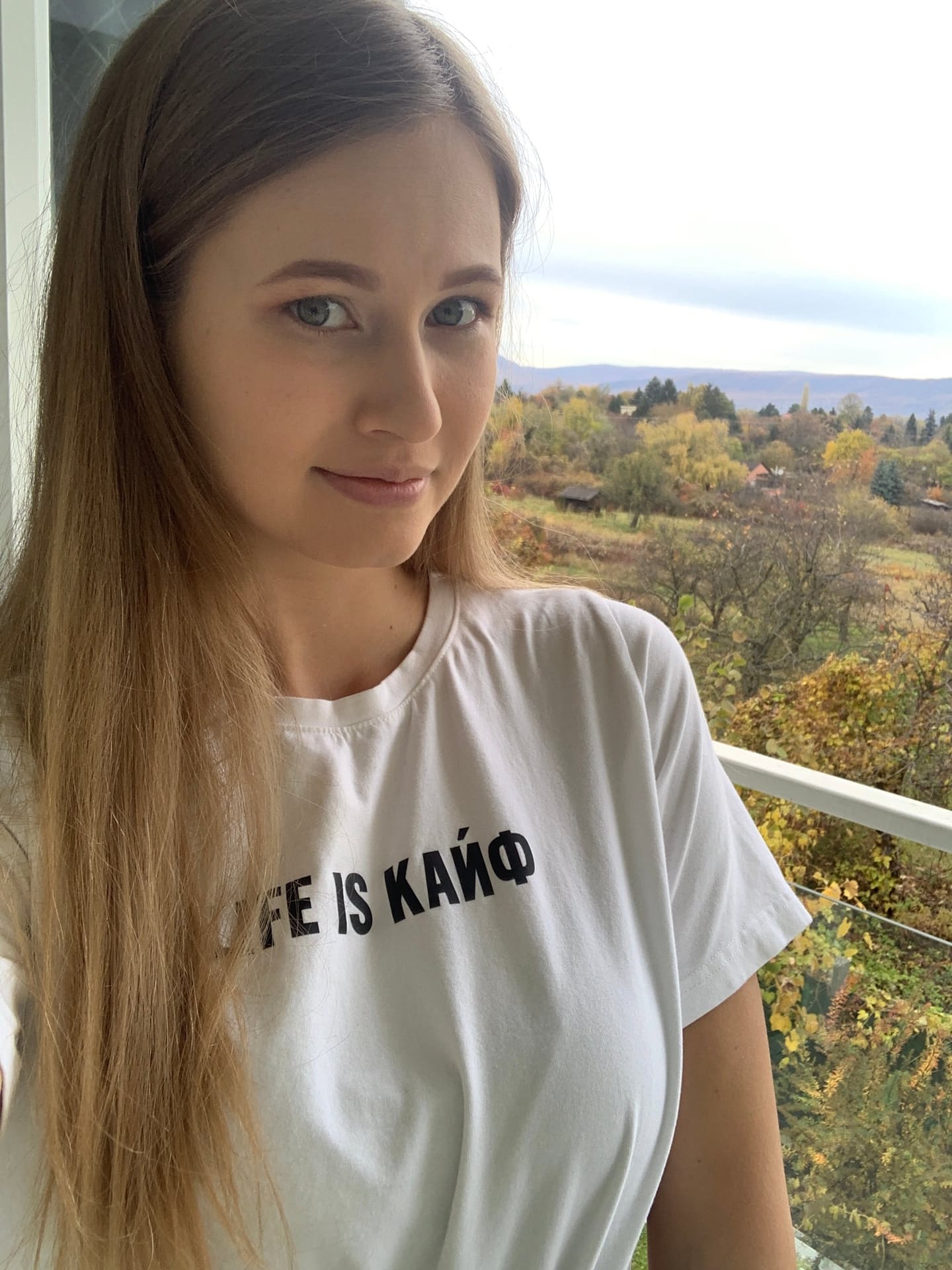 Solo girl with long blonde hair takes selfies in a variety of outfits