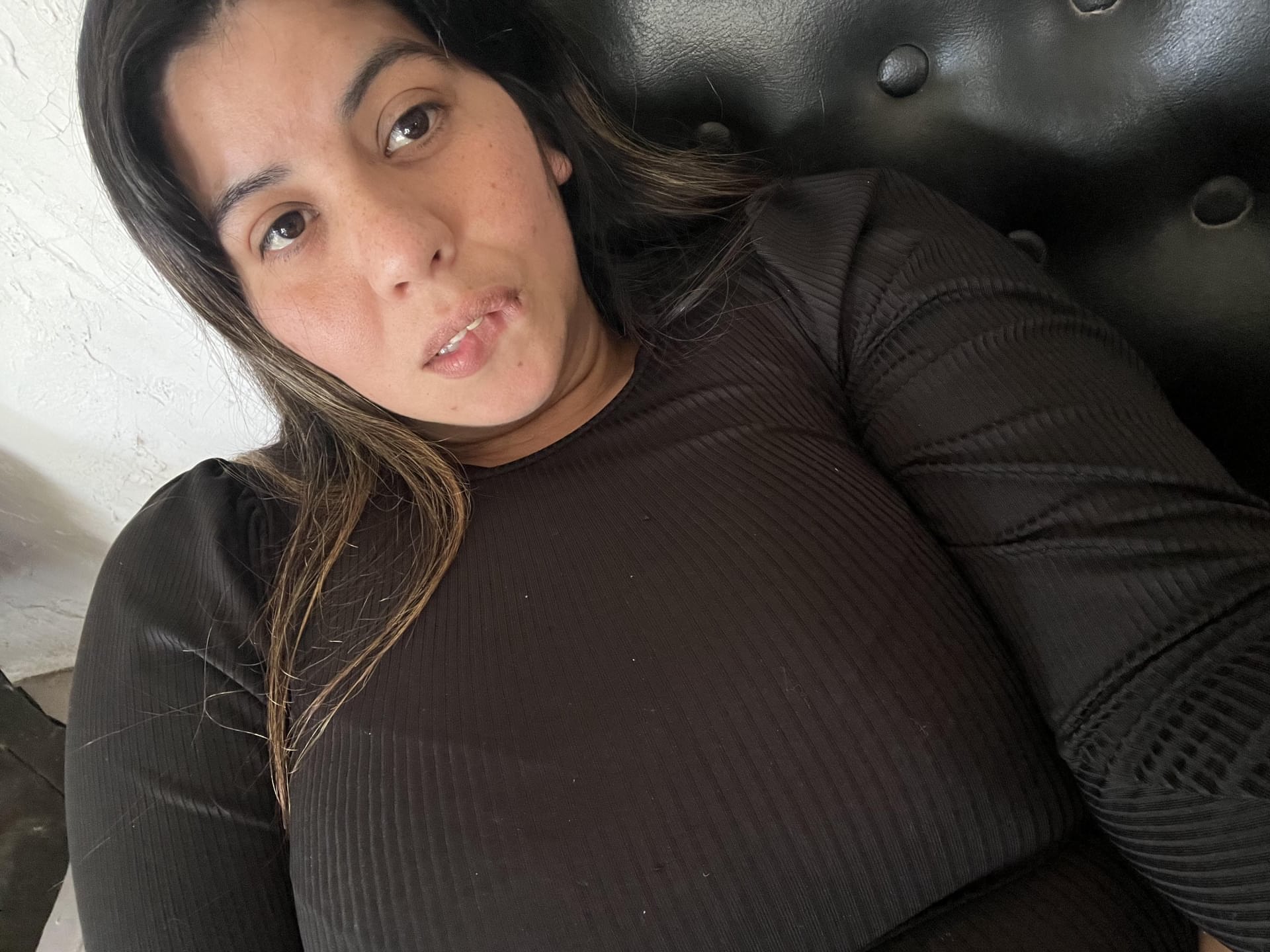 Latina amateur shows her big butt while wearing a short dress