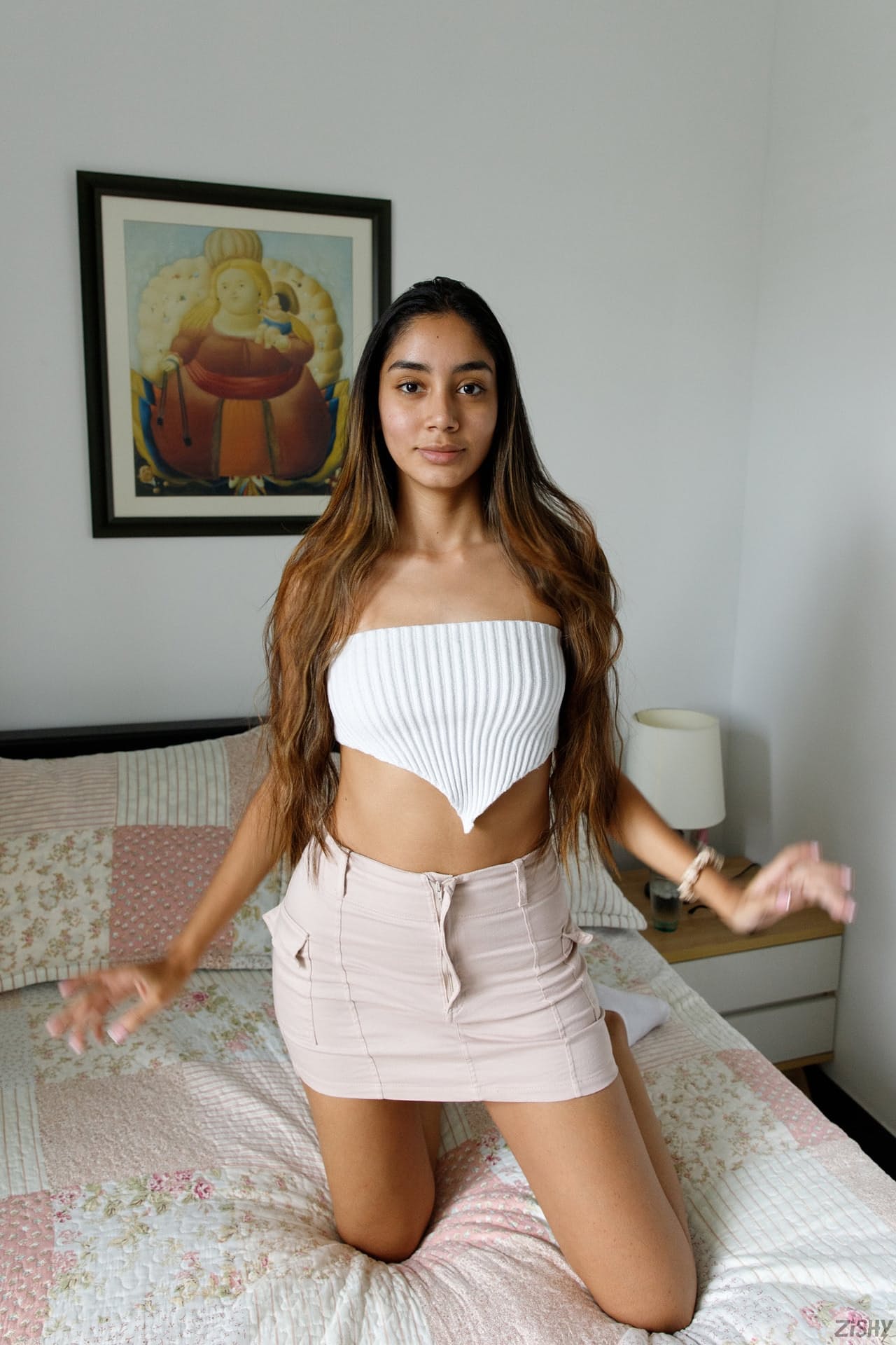 Beautiful babe Paulette Donceles shows her tanned tits and her big ass