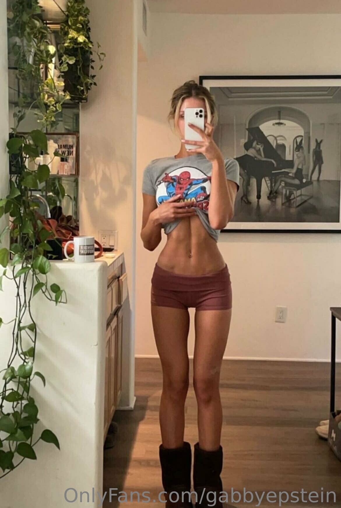 Blonde amateur takes selfies in revealing clothing for a side hustle