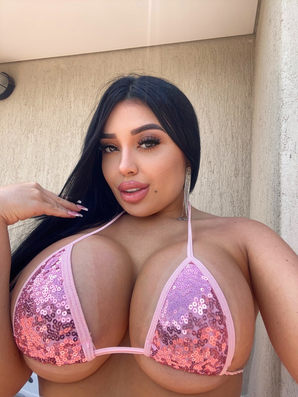 Hot Latina girl shows her huge tits and big ass in public and private locations