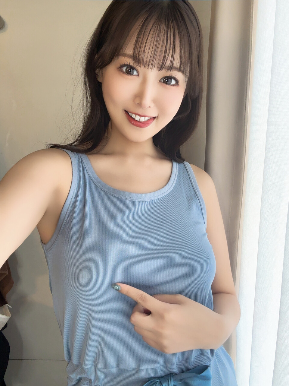 Adorable Japanese girl posts selfies in a variety of revealing outfits