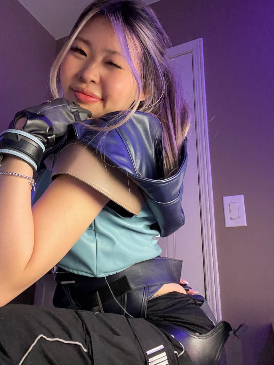 Asian solo girl displays her flexible body in a plethora of outfits