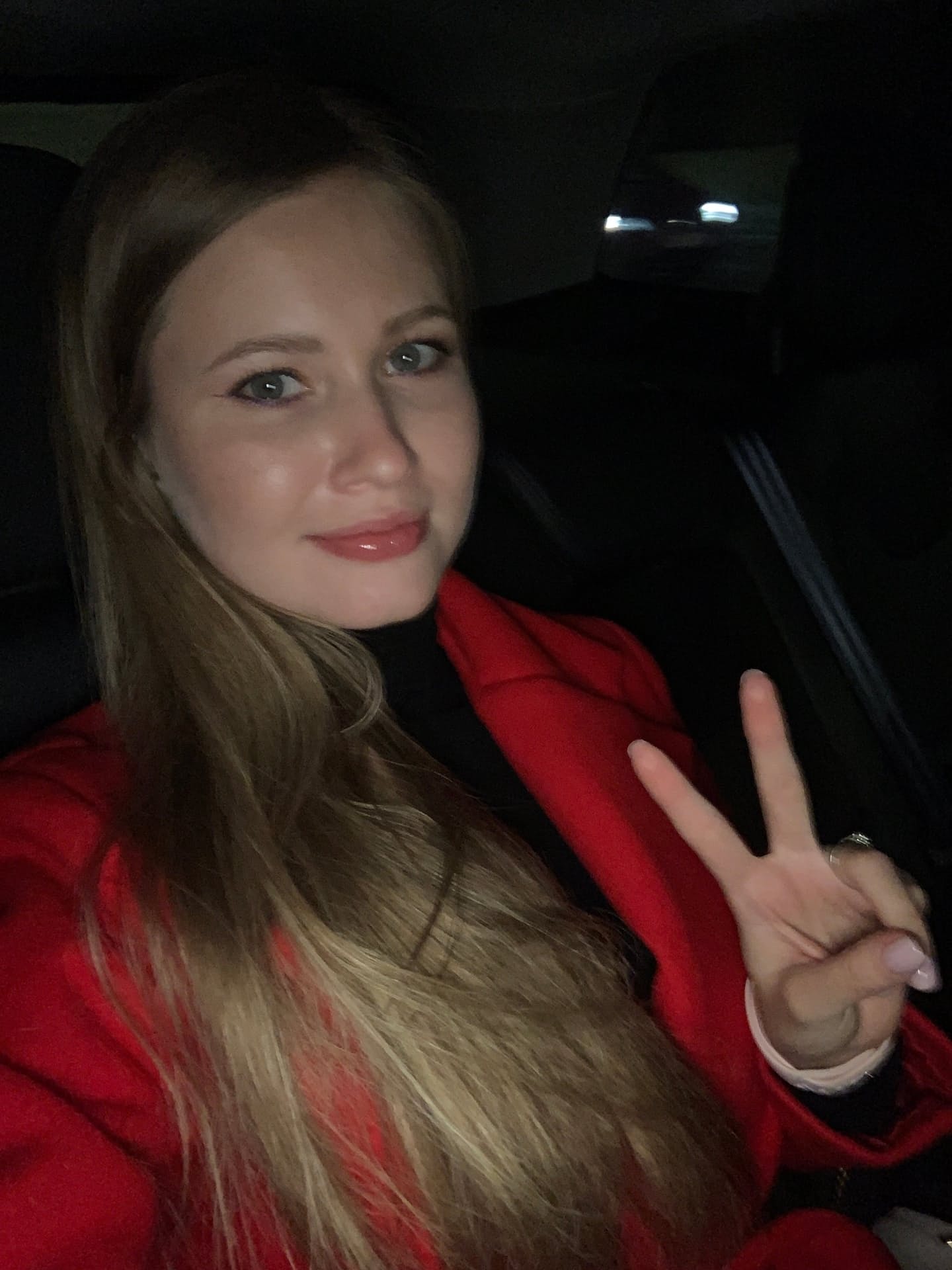 Solo girl with long blonde hair takes selfies in a variety of outfits