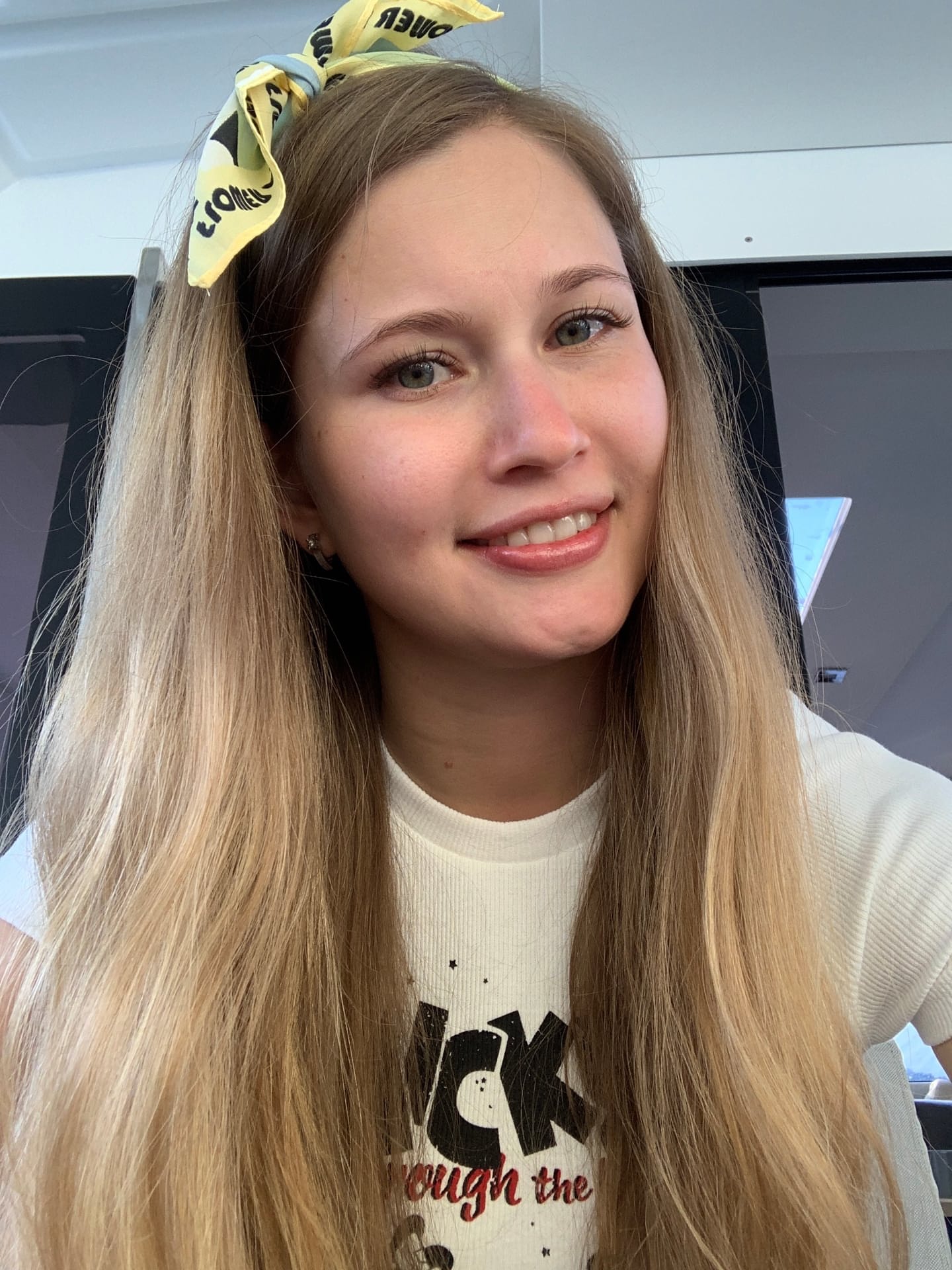 Solo girl with long blonde hair takes selfies in a variety of outfits