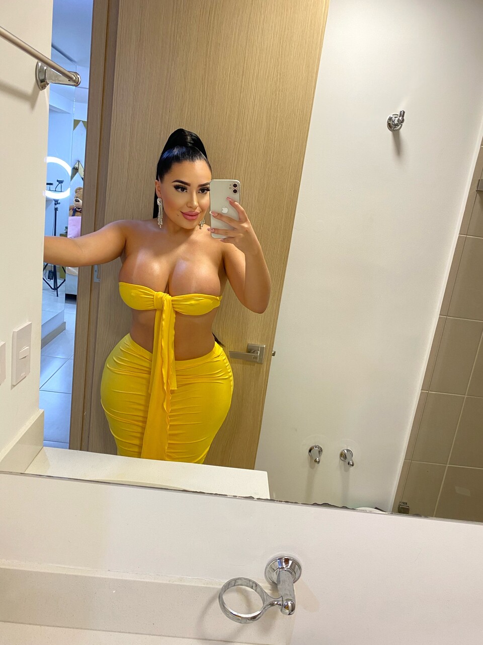 Hot Latina girl shows her huge tits and big ass in public and private locations