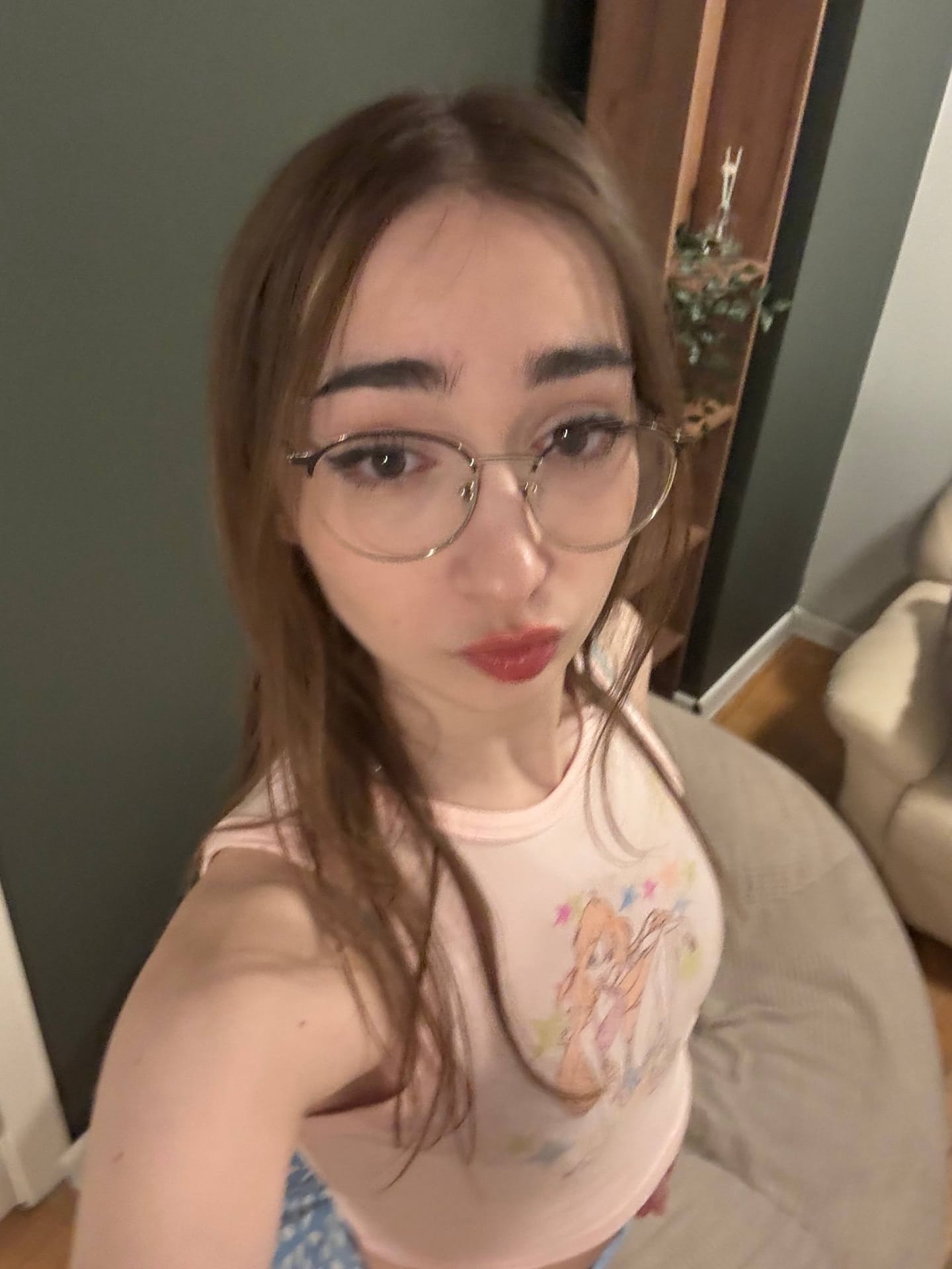 Glasses clad teen strikes great solo poses while mostly clothed