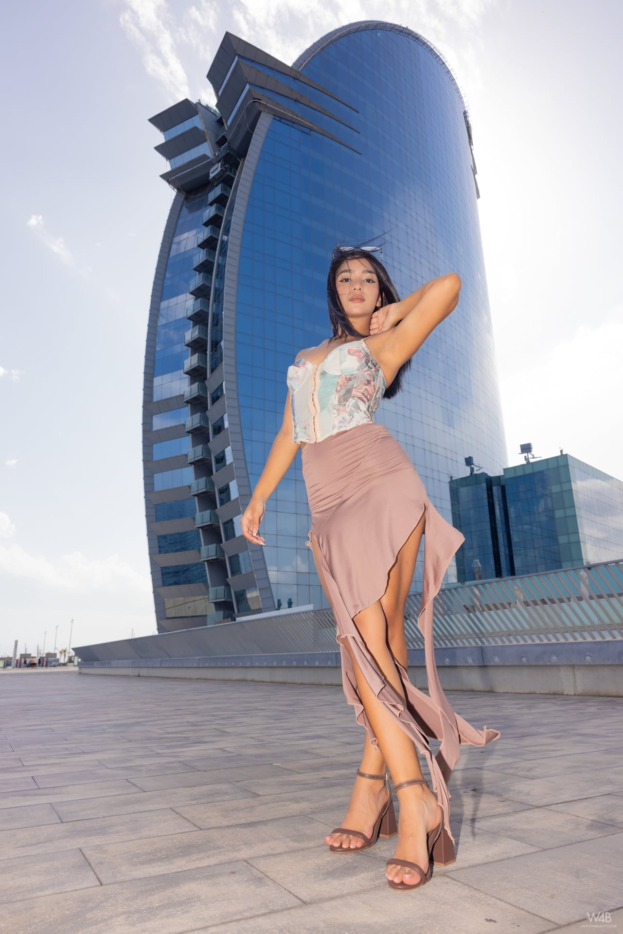Pretty teen doffs a sensual dress before dildoing her tight slit