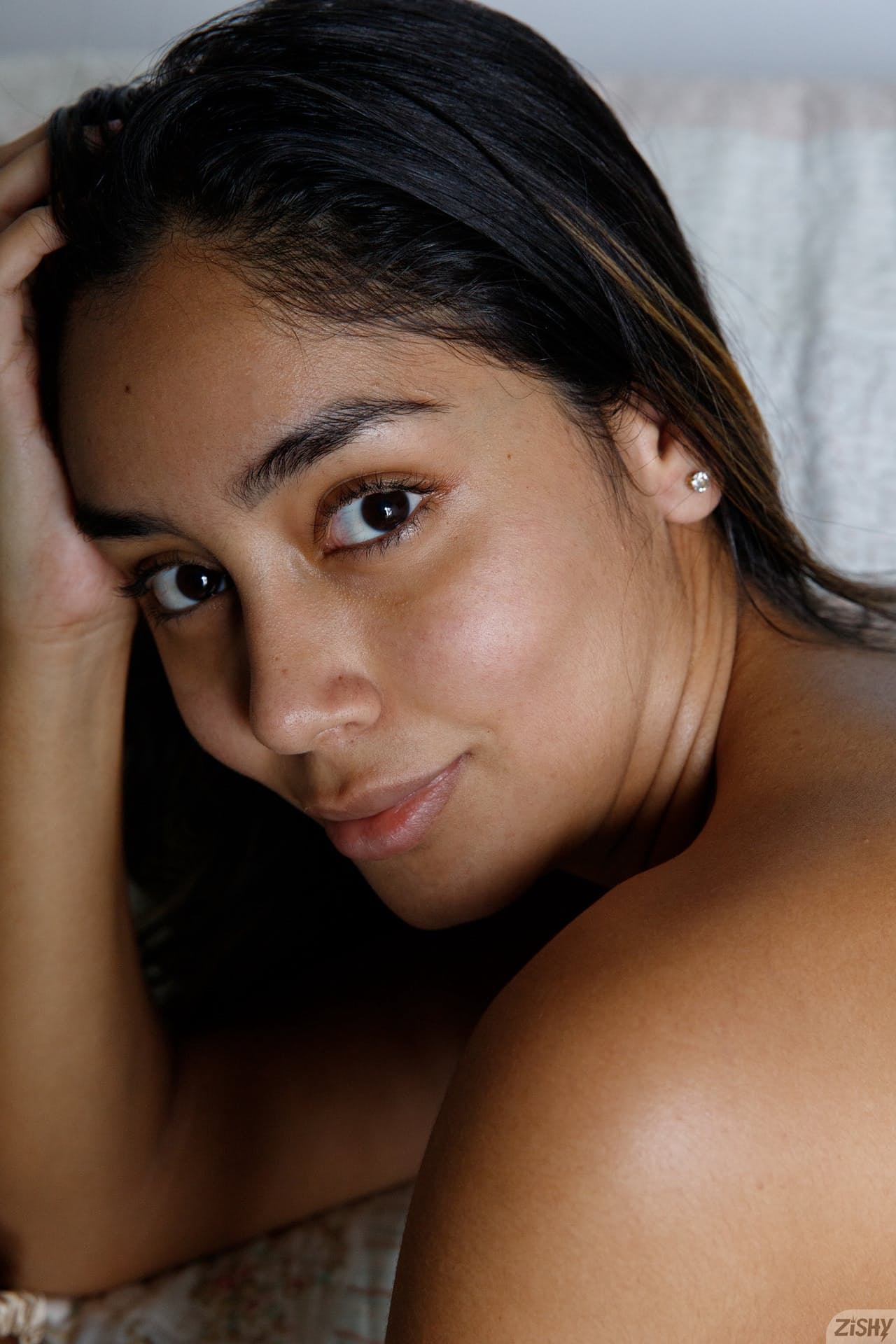 Beautiful babe Paulette Donceles shows her tanned tits and her big ass