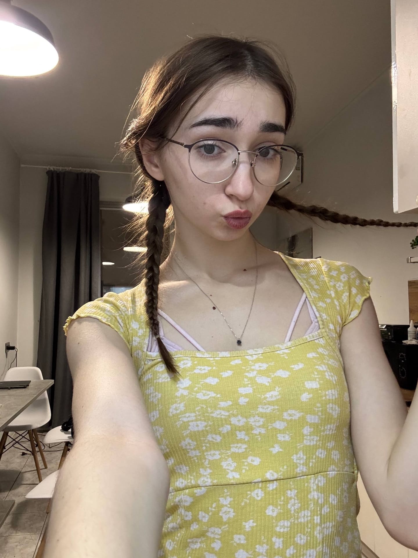 Glasses clad teen strikes great solo poses while mostly clothed