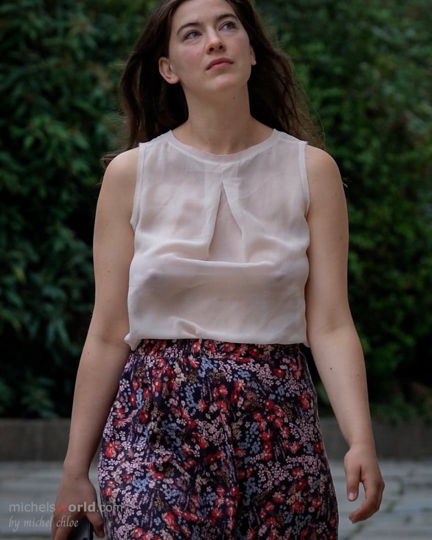 Brunette chick gets caught exposing her cleavage in public places