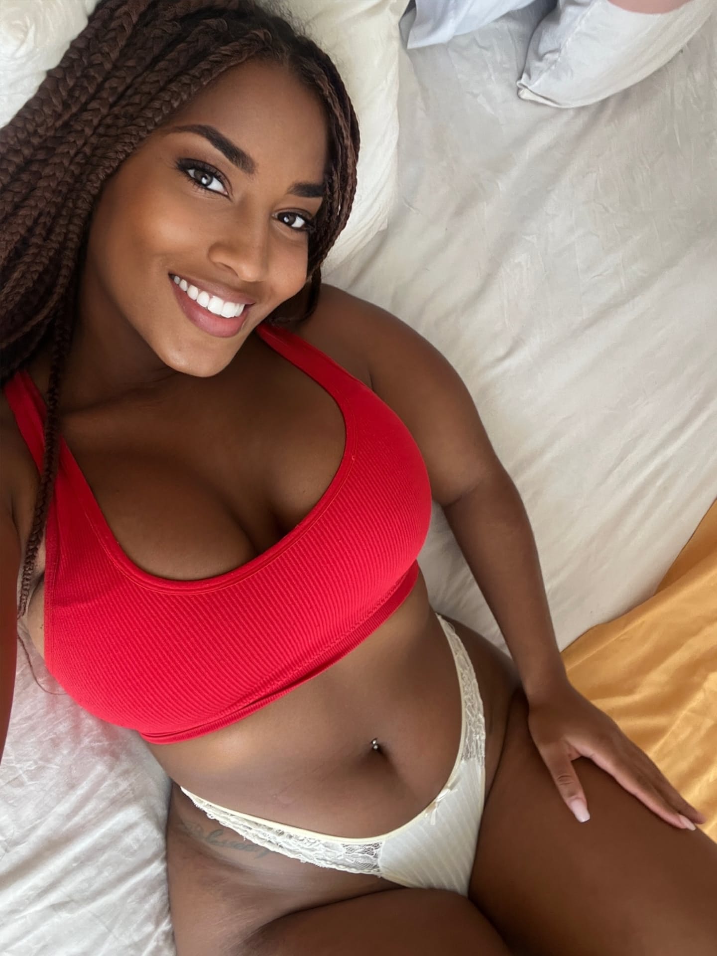 Ebony solo girl models revealing lingerie during non nude action