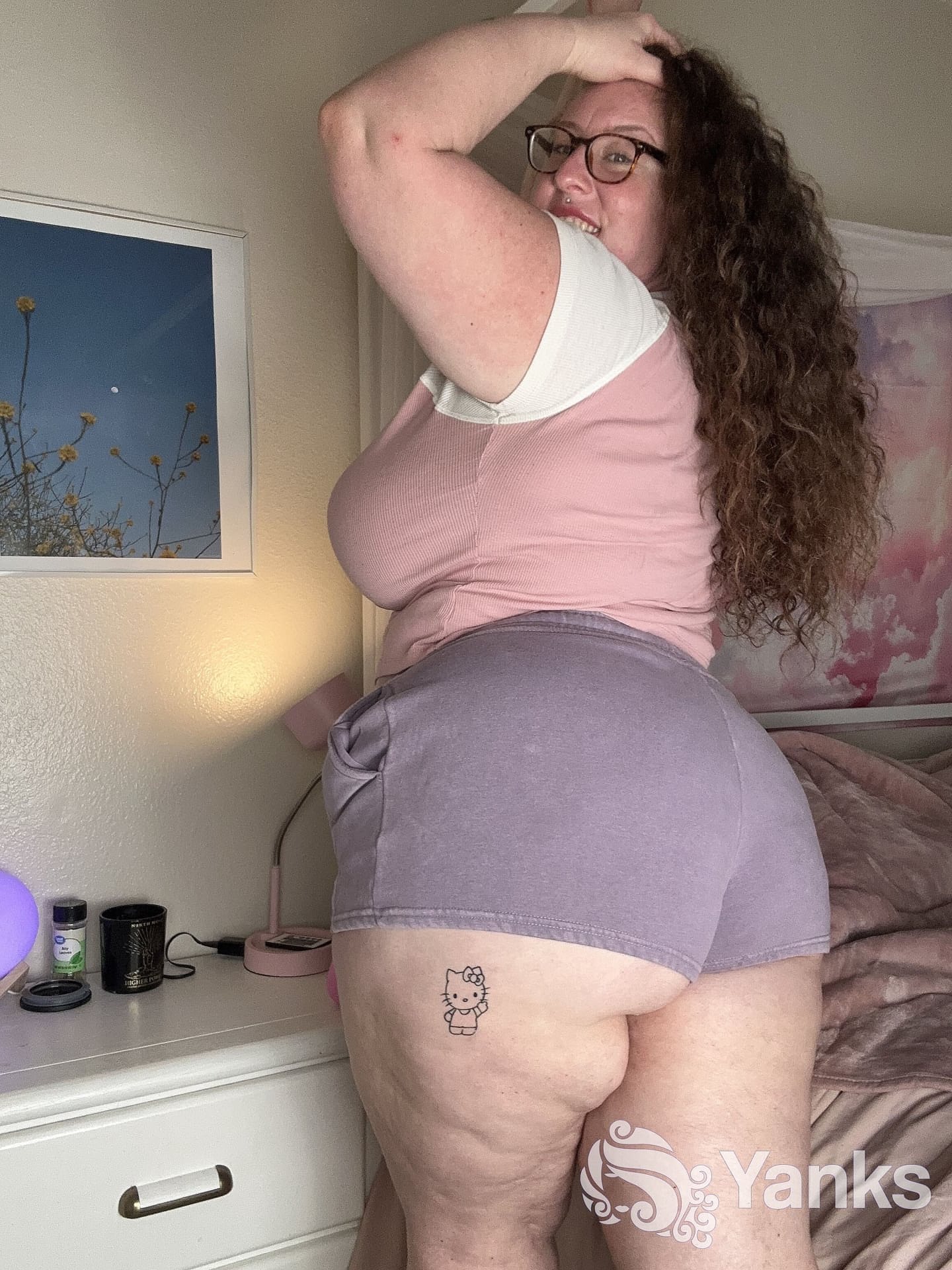 Curly haired amateur Delilah Brooke strips while showing off her chubby body