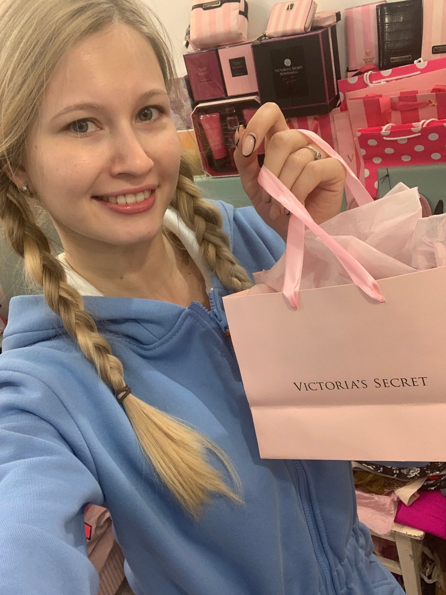 Solo girl with long blonde hair takes selfies in a variety of outfits