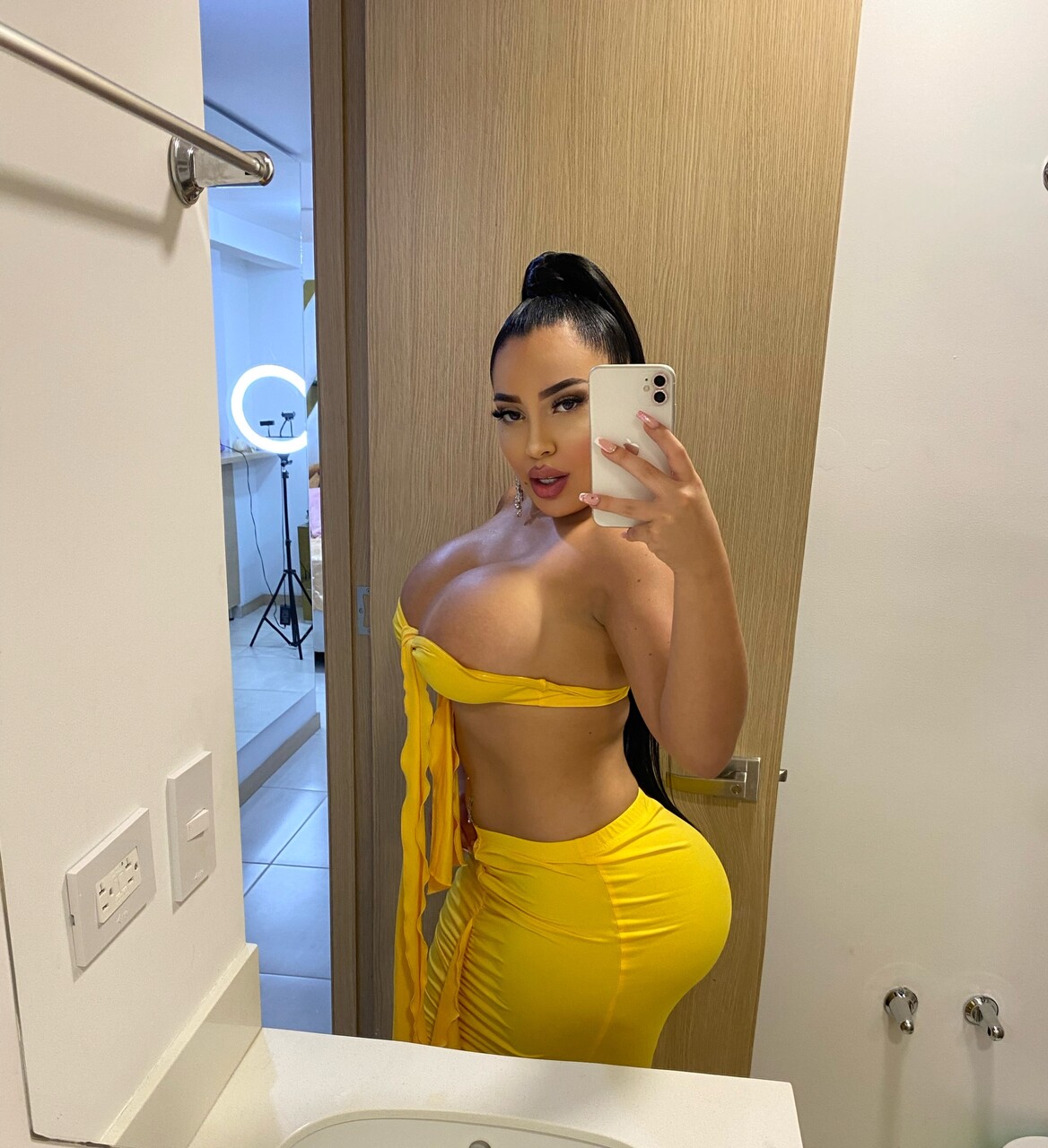 Hot Latina chick with a huge ass takes selfies in a variety of outfits