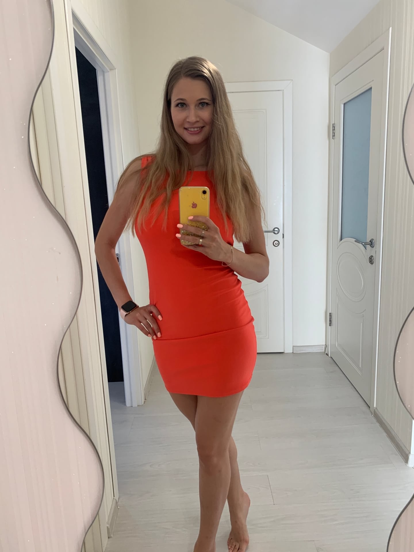 Solo girl with long blonde hair takes selfies in a variety of outfits