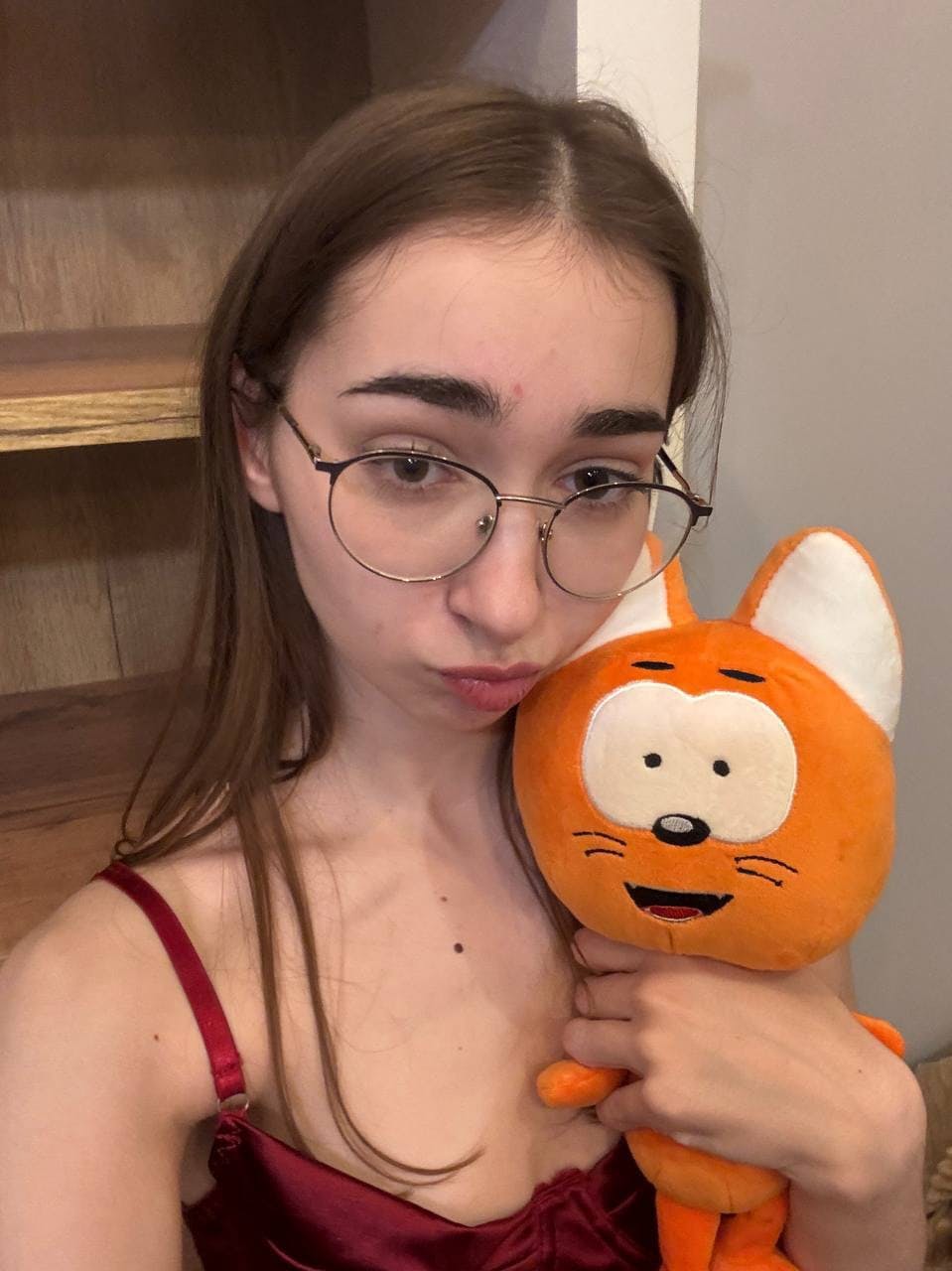 Glasses clad teen strikes great solo poses while mostly clothed