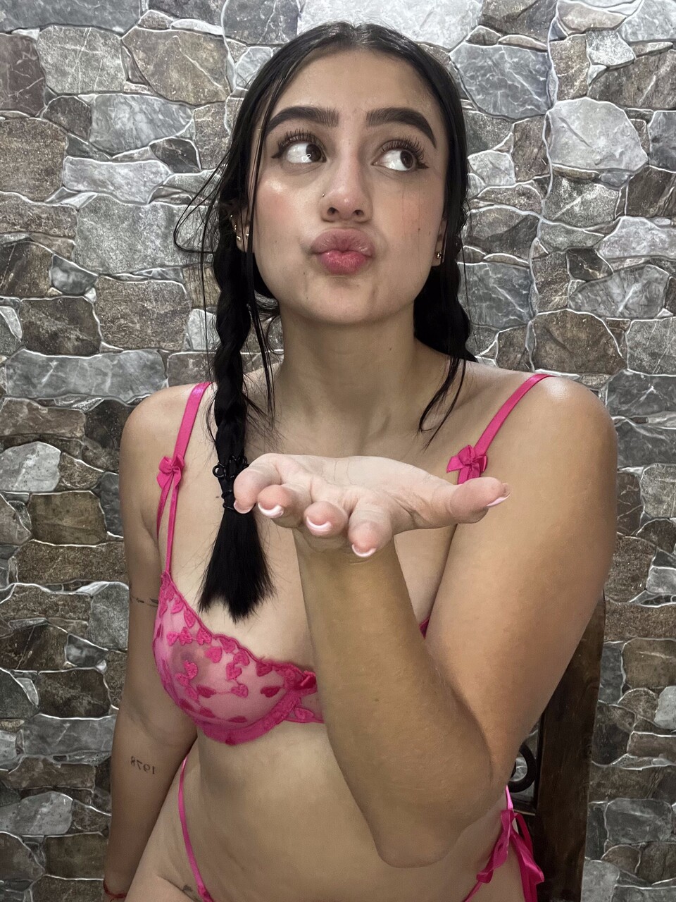 Dark haired teen models her lingerie collection in solo action