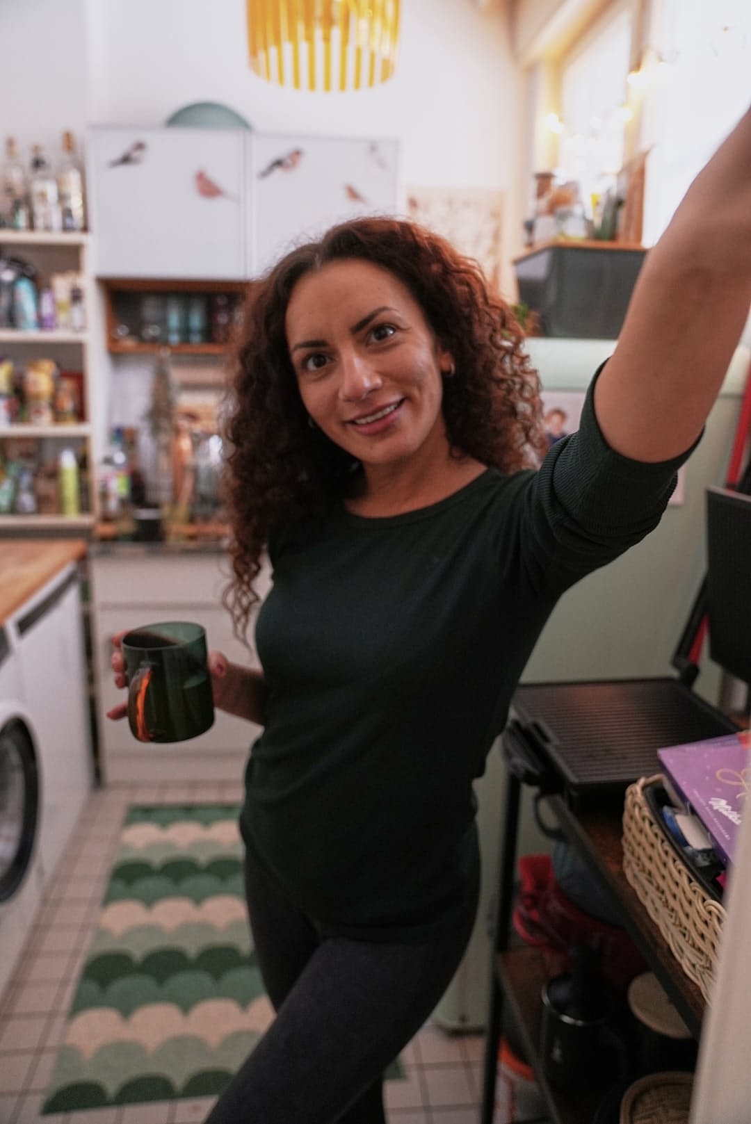 Sexy curly haired mom Sue shows her big ass and plays with a dildo on a bed