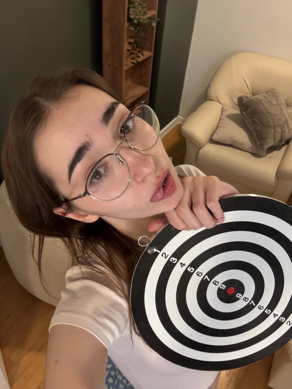 Glasses clad teen strikes great solo poses while mostly clothed