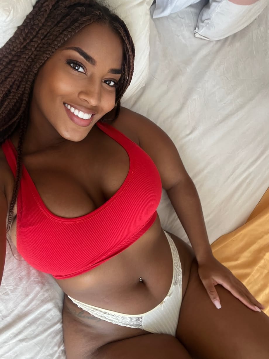 Ebony solo girl models revealing lingerie during non nude action