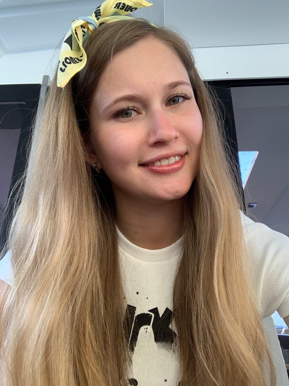 Solo girl with long blonde hair takes selfies in a variety of outfits